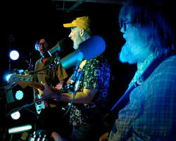 pop rock band playing together live studio